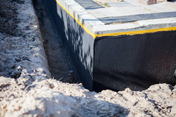 Professional Waterproofing technician working in Pomona, KS